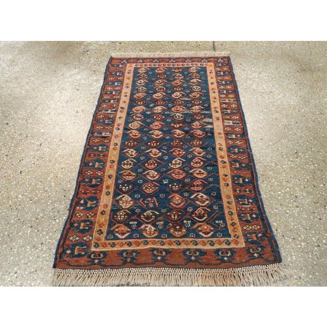 This Early 20th century Central Asian Soumak rug, measuring 1' 11" x 3' 2", exemplifies the refined artistry and rich...