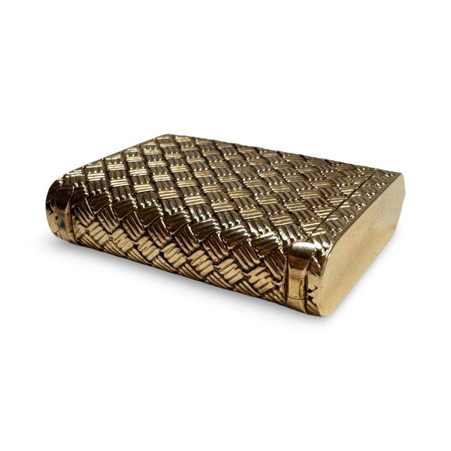 A rare and exquisite find from a private collection, this vintage Tiffany & Co. 14k yellow gold pill box is a true objet...