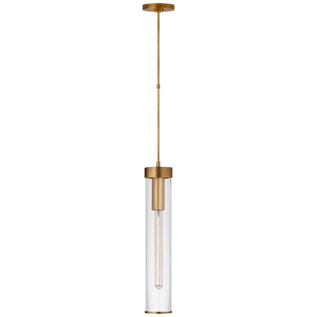 Liaison Long Pendant in Antique-Burnished Brass with Clear Glass Designer: Kelly Wearstler Fixture Height: 18.75" Min....