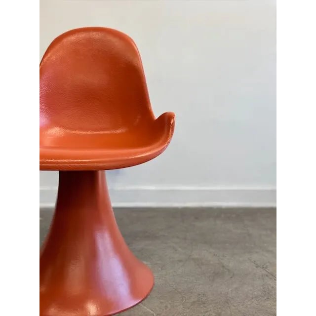 We have a beautifully designed “Space age” era fiberglass accent swivel chair. Dating to the late 60’s-70’s this chair...