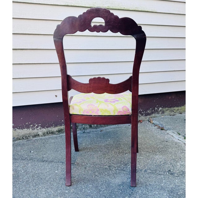 Vintage Victorian Solid Mahogany Floral Carved Side Chair A handsome Victorian-era side chair crafted from solid mahogany,...