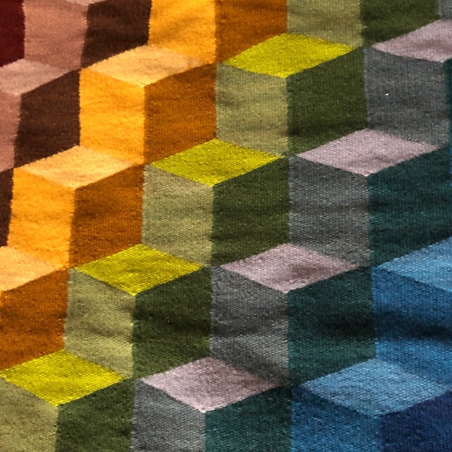 Beautiful tapestry with a bright geometric print. Perfect for the modern interior designer