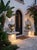 Pair of Vintage Weathered Cast Stone Classical Garden Urns With Scroll Handles For Sale - Image 11 of 12