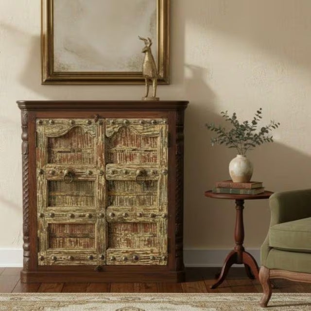 Invite the soul of a bygone era into your home with this breathtaking 1900s Antique Door Upcycled Cabinet. This stunning...