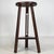 A charming early 20th-century English side table, finely crafted from oak and displaying the restrained proportions,...