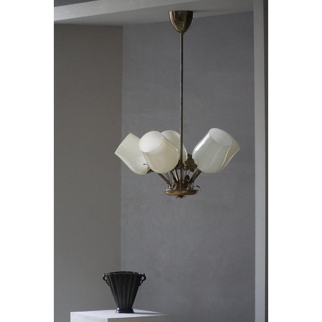 This exceptional chandelier was designed by Paavo Tynell for Idman Oy and dates from the 1940s. It is a masterful example...