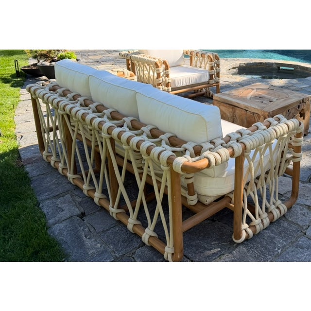 Bring timeless craftsmanship and relaxed luxury into your home with this handcrafted three-seat sofa. Constructed from...