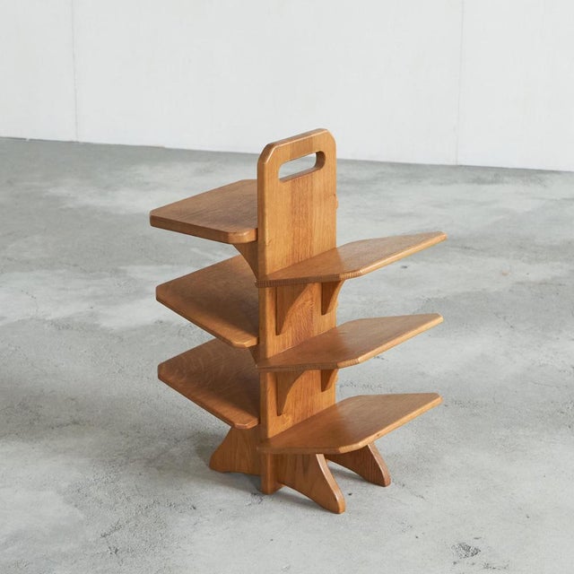 Mid Century Magazine Stand in Solid Oak. Presumably European, 1960s or 1970s. This is a wonderful and very unusual...