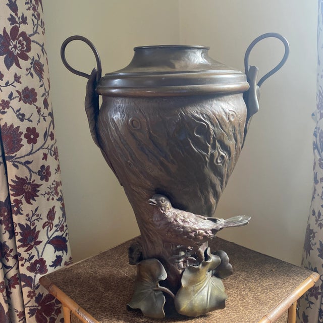 Listing is for a figural copper and bronze urn or vase. I wasn’t able to identify any marks, but it was clearly made by...
