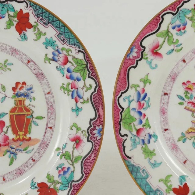 Lovely pair of dinner plates by Minton. Perfect to hang on a wall or add to your set. 10.5 inches in diameter
