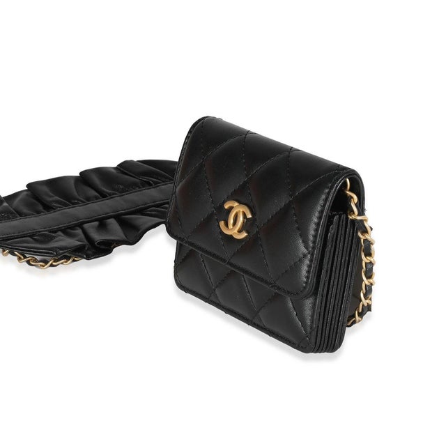 Item #: 137895 Features Interior: Two gussets. Two slip pocket Dimensions: 4 x 3.25 x 1 in Handbag Closure Type: Snap...