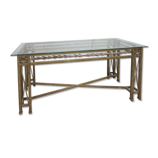 Vintage wrought iron counter height table. Foliate detailing and a faux finish give this piece a Neoclassical styling,...