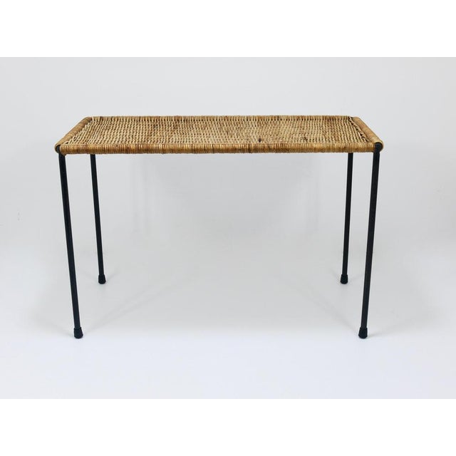 A beautiful rectangular Mid-Century side table / bench from the 1950s. This authentic vintage minimalistic piece was...
