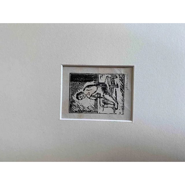 Waiting Man is a woodcut print on paper realized by Mino Maccari in 1926. Hand-signed on the lower in pencil Good...