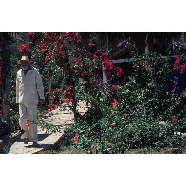 Slim Aarons, John Huston, Estate Stamped Photographic Print, 1979 / 2020s For Sale