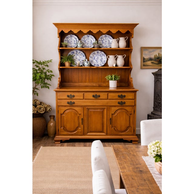 A vintage American maple hutch in a classic Colonial Revival / country style, dating to the late 20th century (circa...