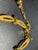 Exquisitely crafted Crown Trifari choker seamlessly blends the fluid, organic aesthetic of twisted rope with the enduring...