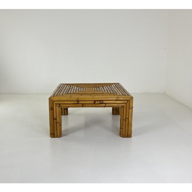 A 1960s bamboo coffee table, attributed to the Vivai del Sud style, a refined expression of Italian design that values...