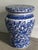 A versatile piece in classic delft inspired blue and white. An indoor/outdoor table or seat decorated in floral vines.