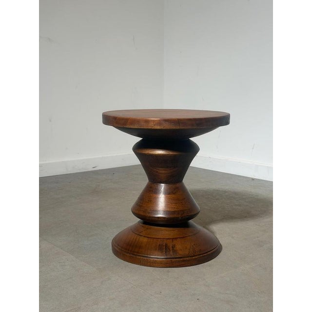 A striking vintage conical stool , expertly crafted from solid mahogany and distinguished by its elegant sculptural...