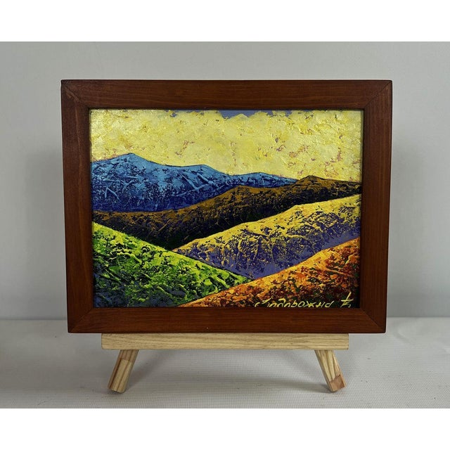 The oil painting on cardboard titled "Hiking in the Mountains in the Evening" is a striking and emotionally evocative...