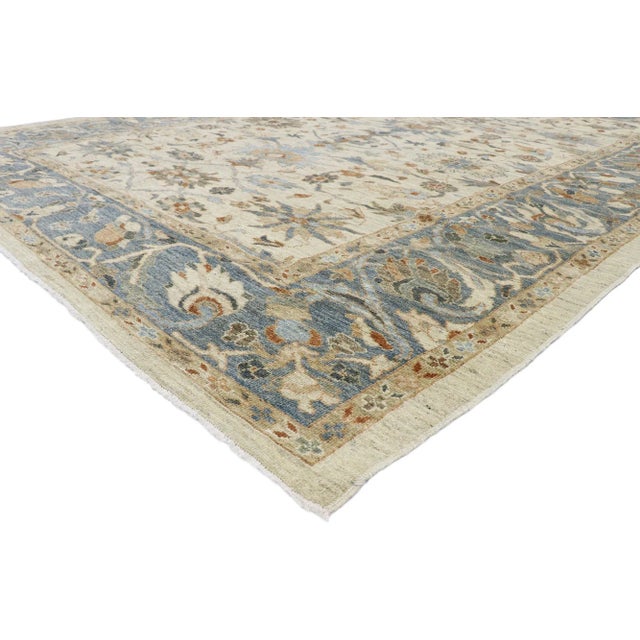 60911 Persian Sultanabad Rug 09'05 x 12'03. This hand-knotted wool Persian Sultanabad rug features an all-over botanical...