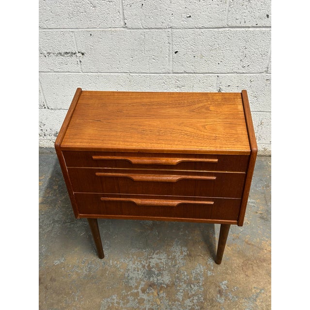 A wonderful small Danish teak 3 drawer commode in its original condition. Lovely and functional, the piece can be used as...