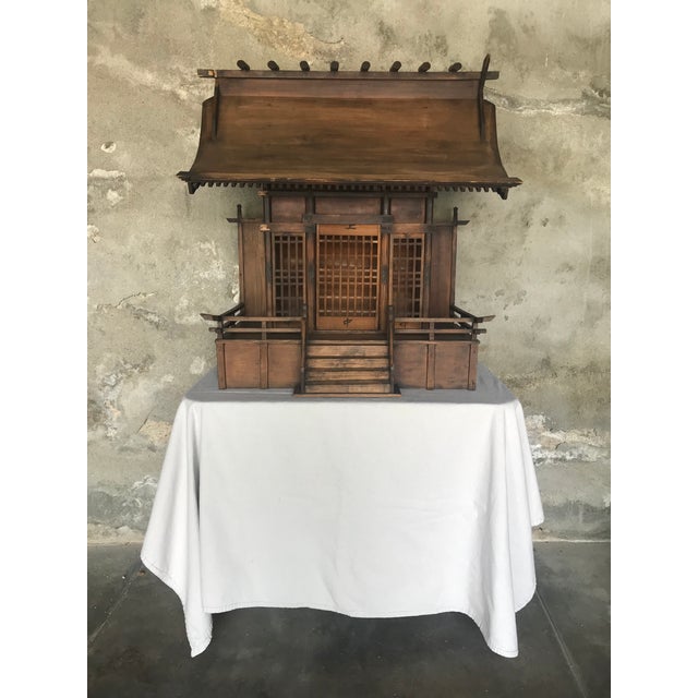 This large vintage Japanese Shinto shrine or kamidana is an extraordinary find. It holds historic, cultural, and spiritual...