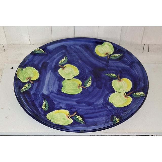 Vintage Italian Ceramic Serving Platter with Yellow-Green Apples on a Blue Background, 1996, in Very Good conditions....