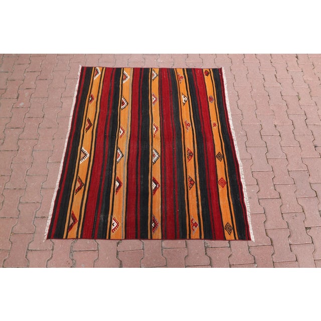 1960s Southwestern Red Striped Ethnic Oushak Kilim Rug Size: 4.9 x 4.4 ft ( 146 x 134 cm) 57 x 52 inches Color: Organic...