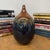 "About This Piece About This Piece Bring warmth and movement into your home with this rounded ceramic vase, where earthy...