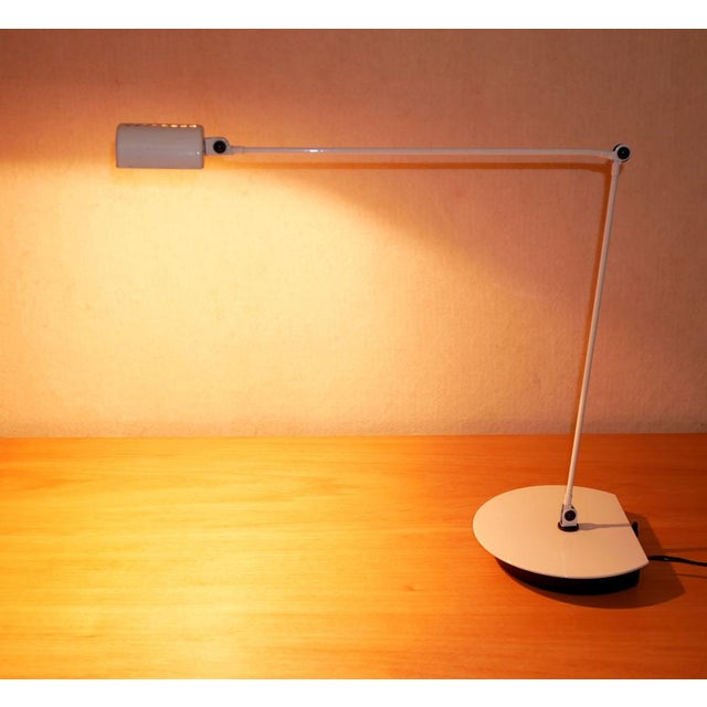 Halogen table lamp with toroidal transformer and intensity regulator, 12 V 50 W bulb Arm with 3 joints. White lacquered...