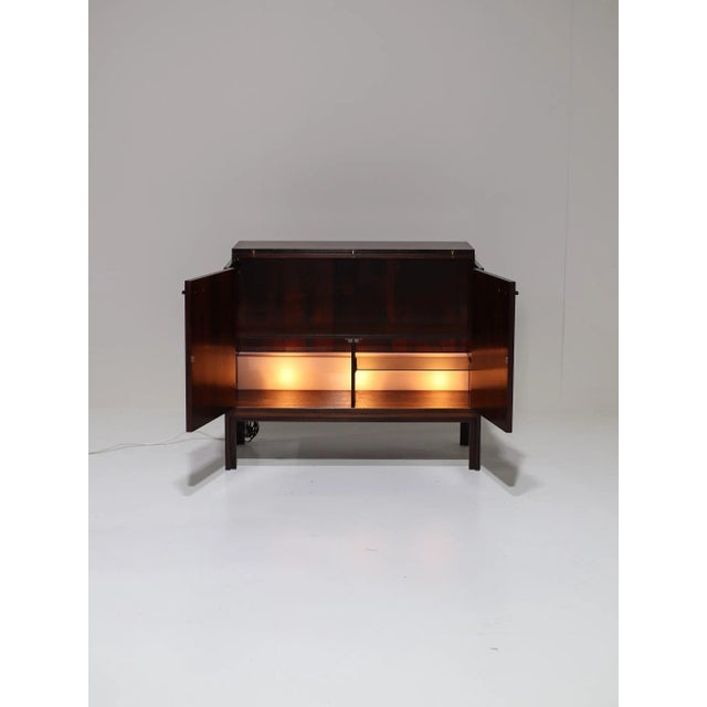 This elegant bar cabinet was produced in the 1960s by Feldballes Møbelfabrik in Denmark and is crafted in beautifully...