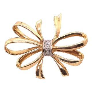 14 Karat Two-Tone Yellow and White Gold Bow Brooch With Diamond Accents For Sale
