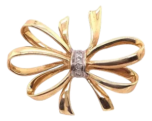 14 Karat Two-Tone Yellow and White Gold Bow Brooch With Diamond Accents