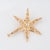 Chic vintage Mid Century diamond star pendant crafted in 14 karat yellow gold (circa 1950s to 1960s). One center set...