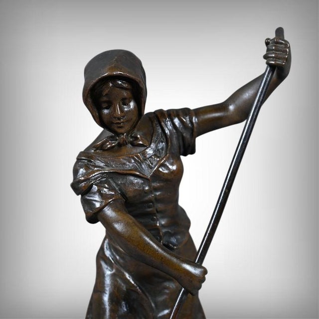 Grisard, The Haymaker, 1930, Bronze, in Very Good conditions. Designed 1920 to 1949 This piece has an attribution mark, I...