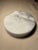 This substantial, vintage mid-century modern round catchall is hand-carved from a solid block of beautiful white marble,...