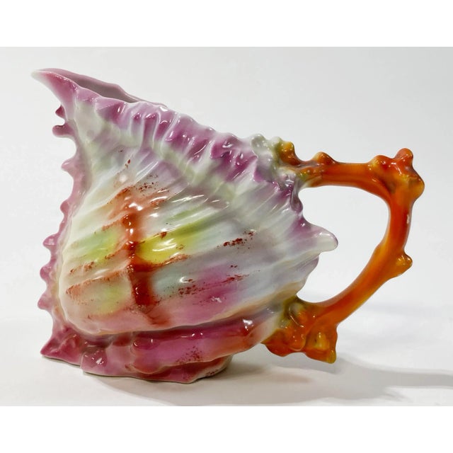 Antique Royal Bayreuth spikey shell creamer pitchers with vibrant colors of pink, green, brown, and orange. Shape and...