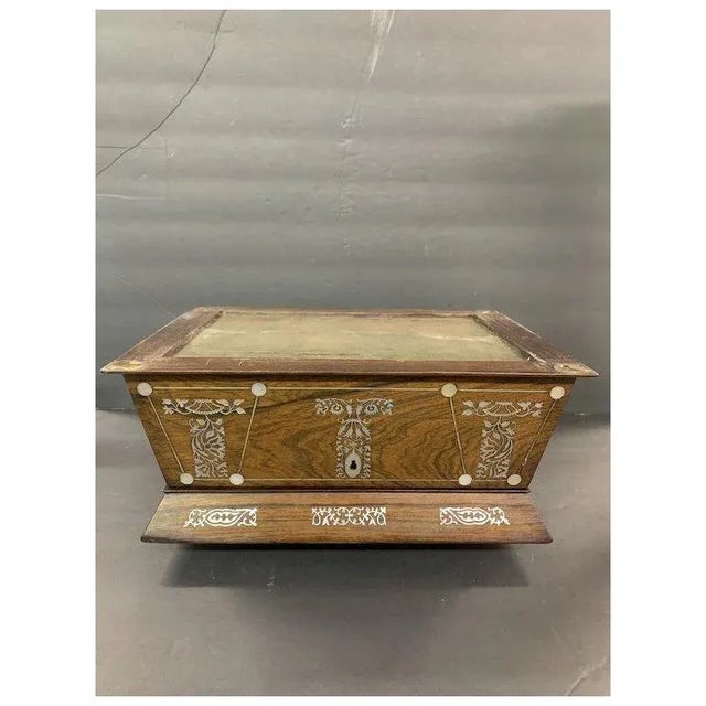 Beautiful Rosewood with canted sides+top.