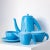 Blue coffee service consisting of a coffee pot, milk and sugar and six cups and saucers. The set was designed by Andrea...