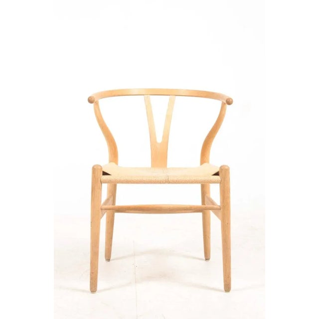 Set of four wishbone chairs in oak and paper cord designed by Hans J Wegner. Great original condition. I have official...