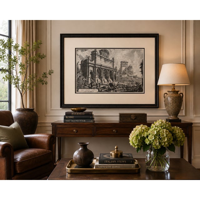 A striking framed architectural etching depicting Veduta del Castello dell’Acqua Paola sul Monte Aureo, after the...