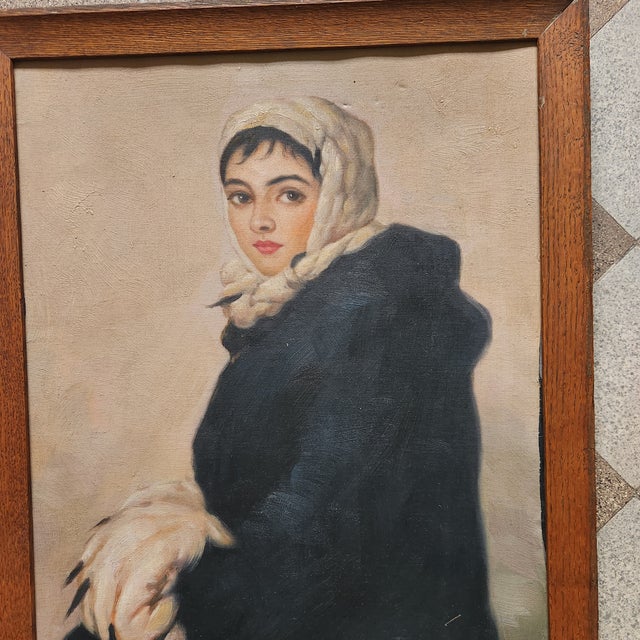 A beautiful portrait of a Victorian girl with a muff. Original frame. Unsigned. Oil on canvas