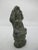 Antique Bayon style Khmer bronze figurine depicting the Buddha sheltered by the Naga serpent king Muchalinda. The Buddha...