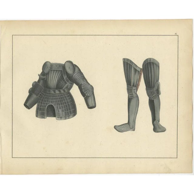 Title: 19th-Century Hand-Coloured Lithograph of Medieval Plate Armor Components : This hand-coloured lithograph presents...