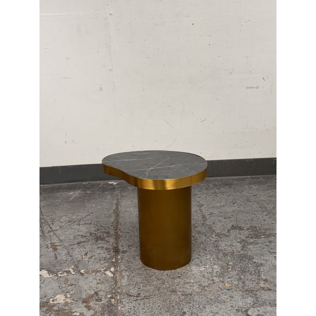 Design Plus Gallery presents a Kidney Side Table from Michael Oren Design. The top is made from Black Marquina marble and...