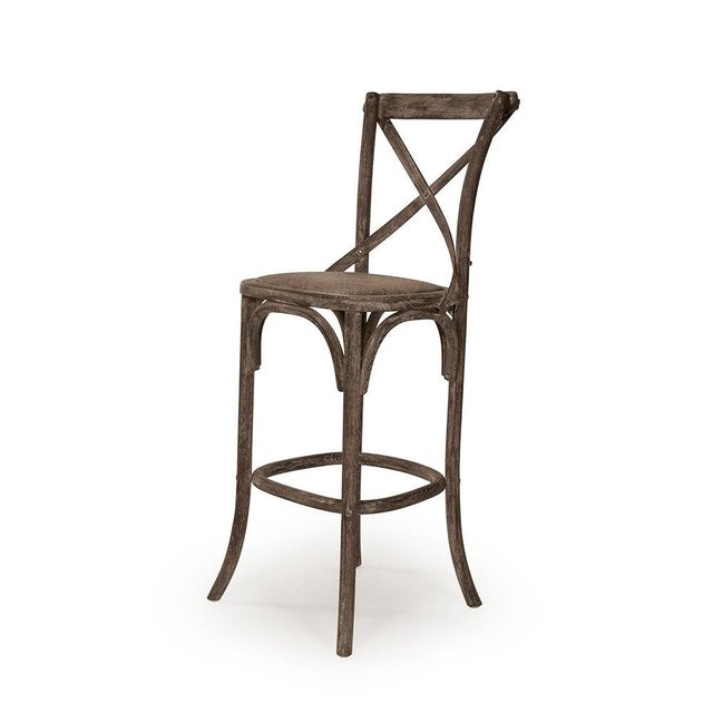 The Parisienne Cafe Bar Stool from Zentique brings the classic French cross-back bistro chair to bar height at 30"....