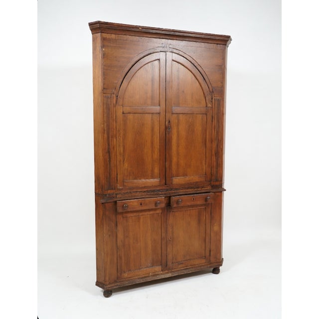This impressive vintage corner cabinet brings timeless elegance and smart storage to any room! Expertly crafted in rich...