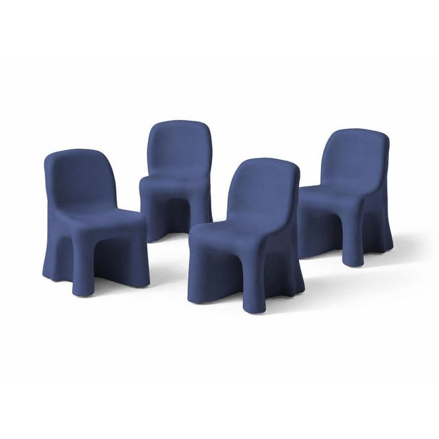 This set of four Dalila armless outdoor chairs designed by Gaetano Pesce for Cassina presents a striking contemporary...